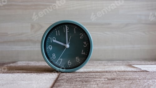 Preview: clock on wood background. daylight savings time concept, copy space.