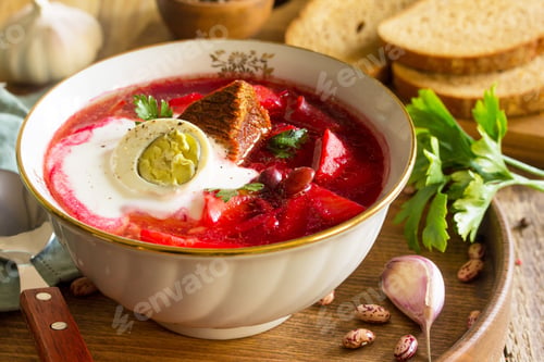 Preview: Traditional ukrainian russian borscht. Borsch, beetroot soup with sour cream in bowl.