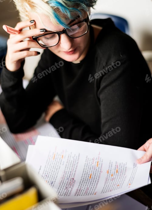 Preview: Stressed Woman with her Error Journal Paper