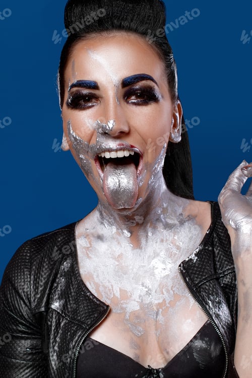 Preview: Girl With Creative Make-Up On A Blue Background