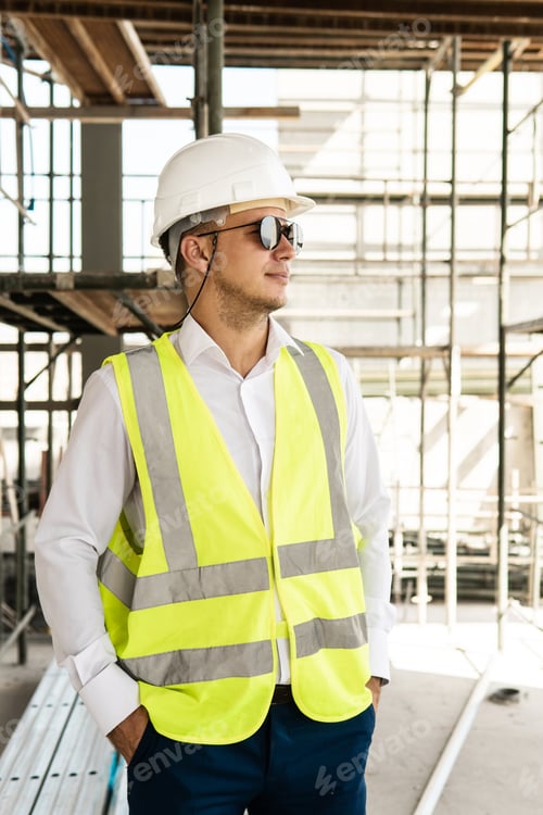 Preview: Architect wearing safety vest on a construction site