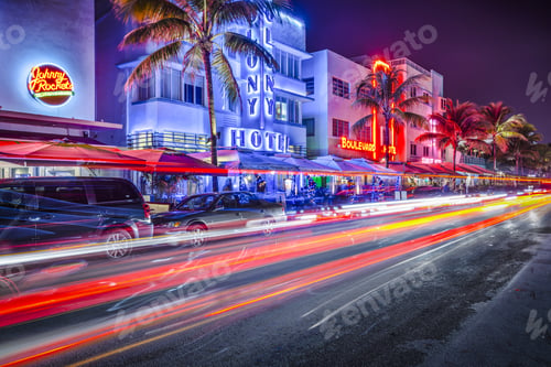 Preview: Miami, Florida - January 6, 2014: Cars Speed Down Ocean Drive. The Road Is The Main Thoroughfare