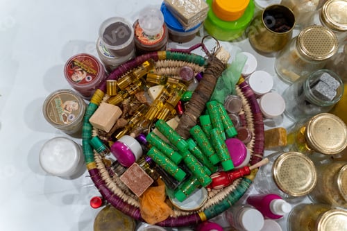 Preview: Top view of a basket of local colorful beauty products of different types