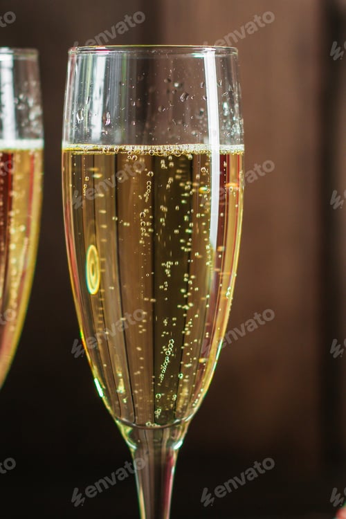 Preview: Champagne In Transparent Glasses And A Bottle (New Year'S Atmosphere, Christmas) Of Happy Holidays