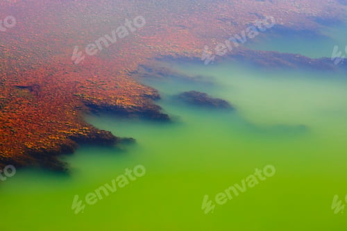 Preview: Multicolored mineral stratum on river