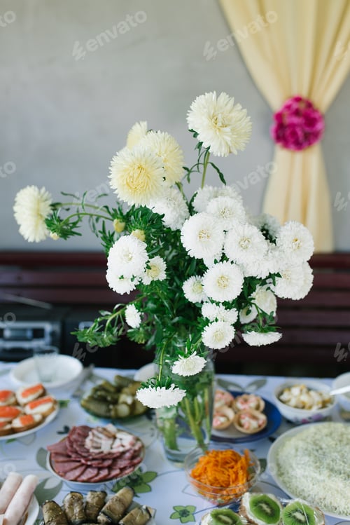 Preview: Bouquet of Homemade Asters in Glass Vase in Decor of Country Banquet