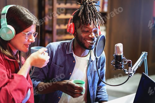 Preview: Multi-ethnic couple recording a vlog session online