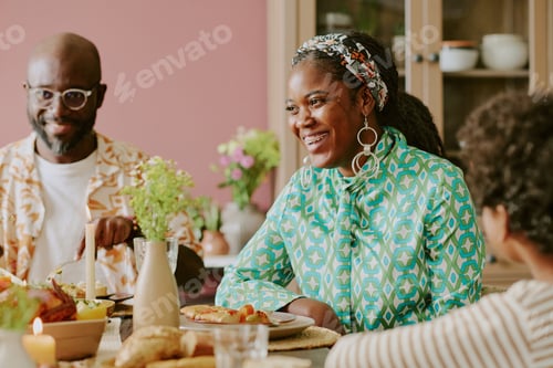 Preview: Smiling Woman at Table