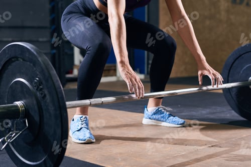 Preview: Beautiful Woman Lifting Heavy Barbell