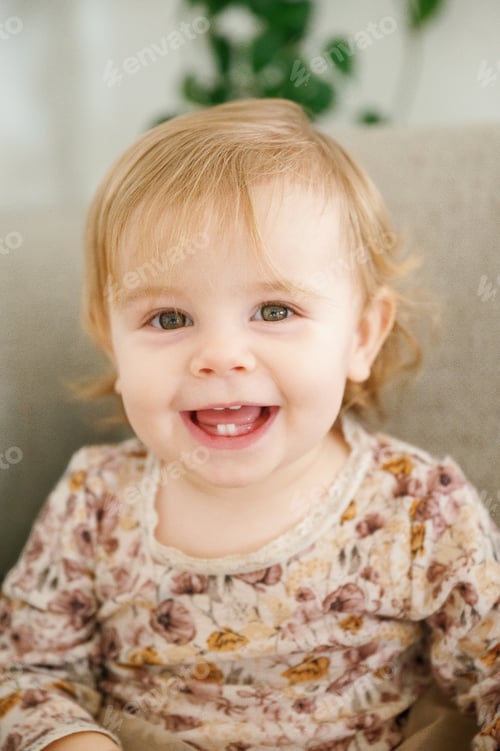 Preview: Joyful Toddler girl with a Big Smile