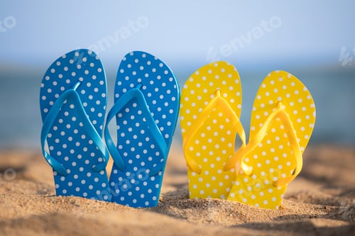 Preview: Beach flip-flops on the sand