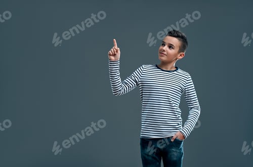 Preview: Fashionable boy on a gray background