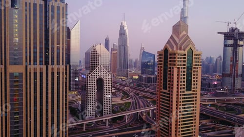 Preview: Beautiful aerial view with sky from top to sunrise and city futuristic skylines buildings and