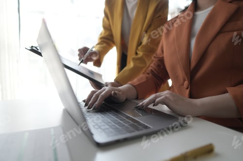Preview: Accountant team working in office, a team discussing financial reports