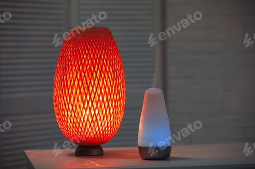 Preview: Modern essential oil diffuser on table indoors