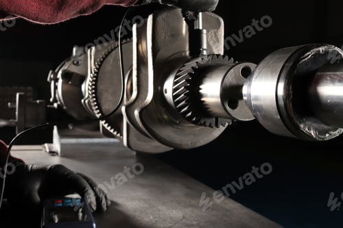 Preview: Master makes metal hardness measurement. Crankshaft.