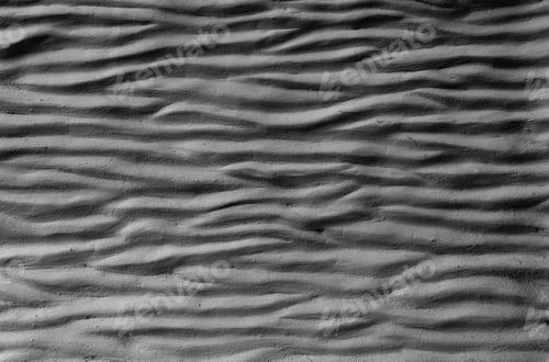 Preview: black cement wall curved with wave pattern. Modern design of black wavy background
