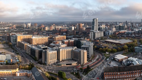 Preview: Aerial panorama of Holbeck in a Leeds cityscape skyline with an early morning sunrise