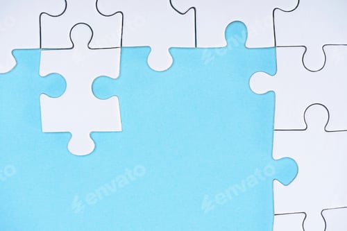 Preview: top view of white puzzles arrangement on blue background