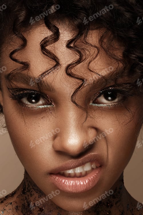 Preview: Portrait of a girl with emotion on her face. Anger