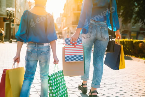 Preview: sale, consumerism, money and people concept - happy young woman with shopping bags