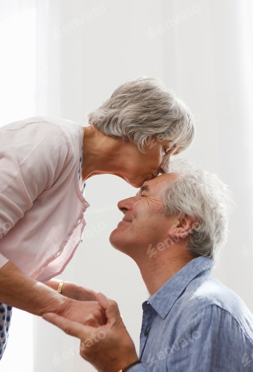 Preview: Affectionate senior couple sharing a loving moment