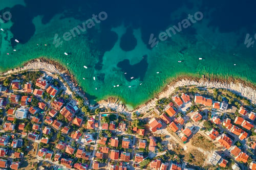 Preview: Aerial view of residential buildings of coastal town near sea beach
