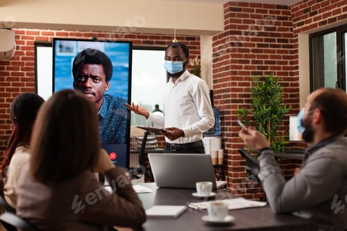 Preview: African american manager with medical face mask against coronavirus