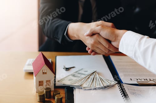 Preview: Home sales agents and buyers work on signing new homes and shaking hands.