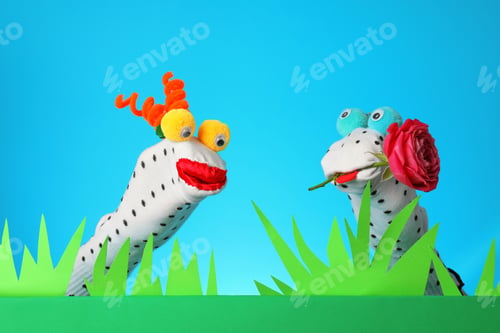 Preview: Creative puppet show on stage with prop and decorations against light blue background