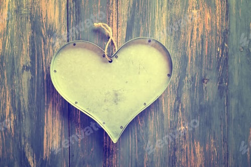Preview: Heart Of Metal Decoration On Wooden Gray Background