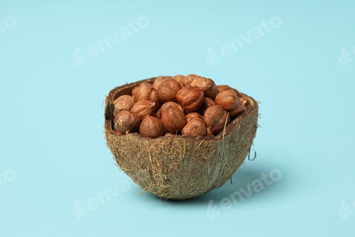 Preview: Healthy food and healthy nutrition concept, nuts - hazelnut
