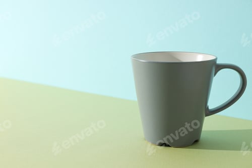 Preview: A beautiful dark cup on a light background