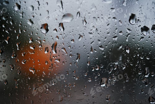 Preview: Close-up view of the rain drops on the glass