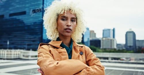 Preview: Portrait, urban fashion or woman with arms crossed or confidence in trendy coat in New York. Outdoo