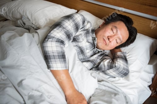 Preview: A man sleeping soundly