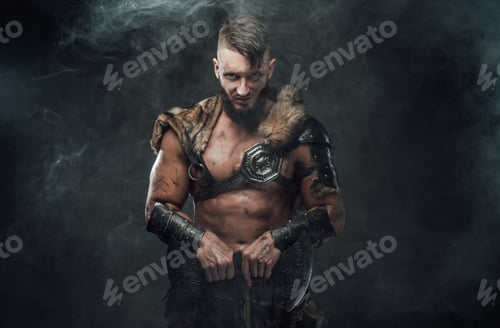 Preview: Mad scandinavian warrior with huge axe in dark smokey background