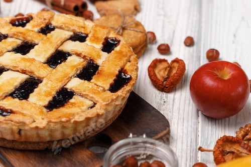 Preview: Berry tart pie on white wooden table