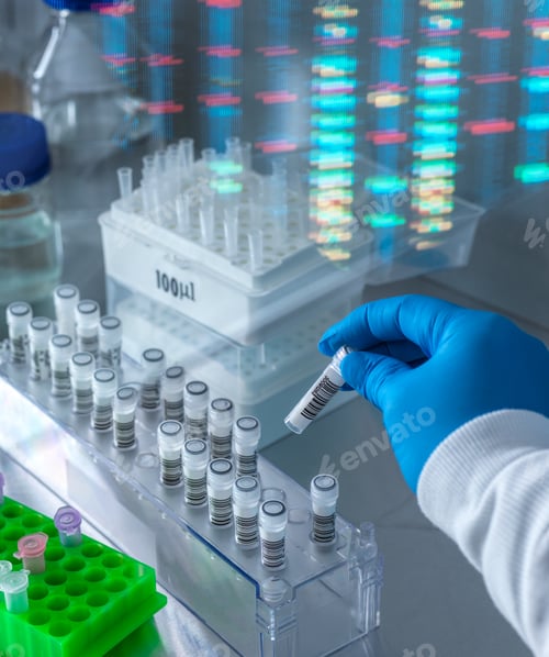 Preview: UK, Buckinghamshire, High Wycombe, Scientist holding vial