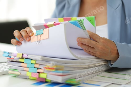 Preview: Senior businesswoman is stressed from doing too much paperwork.