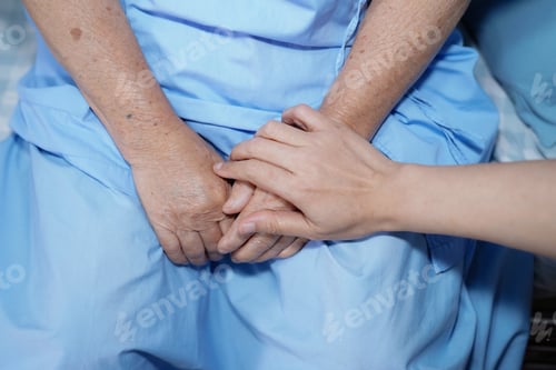 Preview: Touching hands Asian senior or elderly old lady woman patient with love, care, helping, encourage an