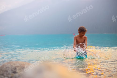 Preview: Boy in lake Louise Alberta Canada