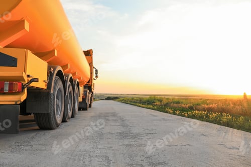 Preview: Modern yellow truck parked on country road
