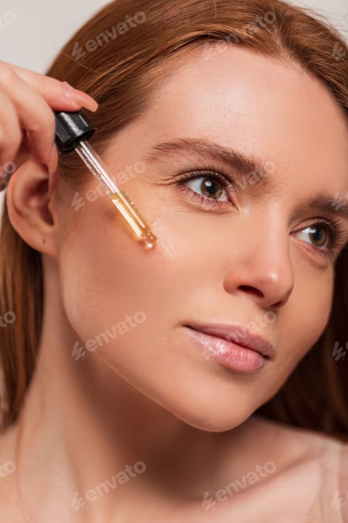 Preview: Beautiful fresh young redhead woman in the studio. Pretty beauty girl