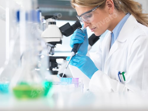 Preview: Female scientist pipetting sample into a vial for analytical testing in a laboratory