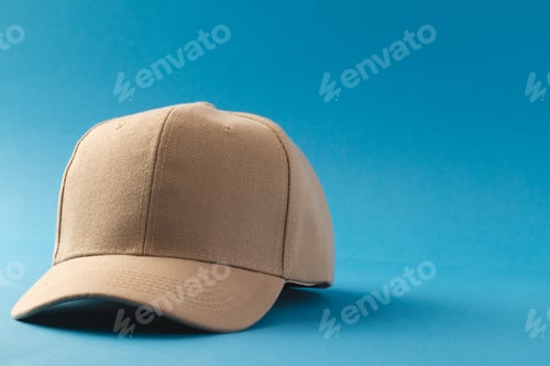 Preview: Cream baseball cap and copy space on blue background