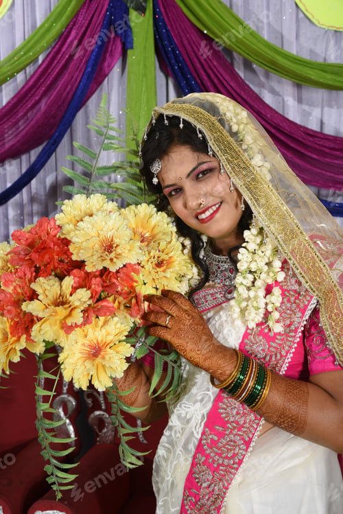 Preview: Indian bride wearing traditional wedding cloths in marriage ceremony.