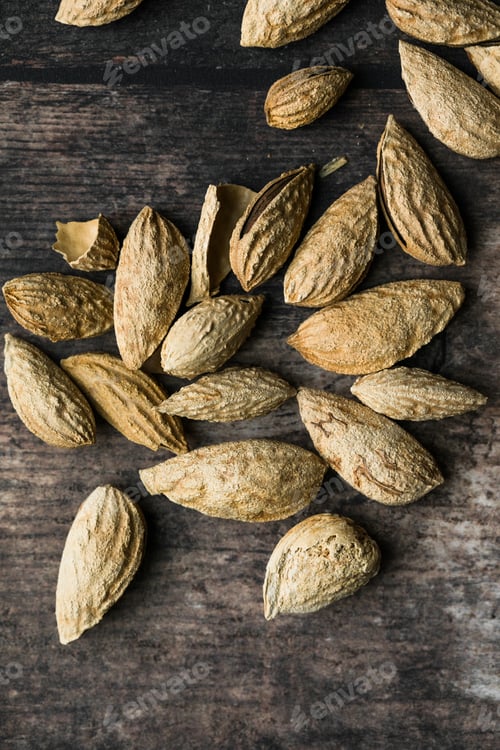 Preview: Raw Almonds on a Rustic Wooden Tabe