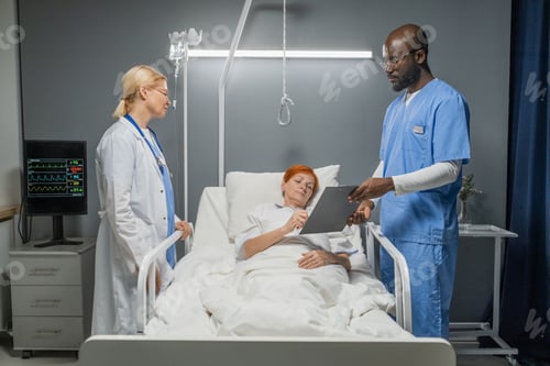 Preview: Elderly patient signing an agreement for operation