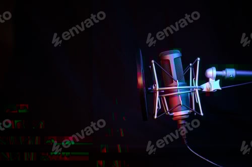 Preview: a black microphone on black background under the neon light. podcasting, singing, and recording .